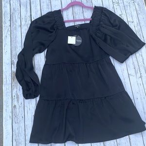Brand new long sleeve black ruffle loose fit dress.